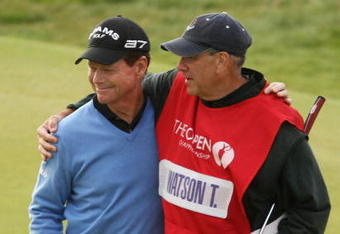 TURNBERRY, SCOTLAND - JULY 19:  Tom Watson of USA embraces his caddie Neil Oxman on the 18th green following his defeat in a playoff against Stewart Cink during the final round of the 138th Open Championship on the Ailsa Course, Turnberry Golf Club on July 19, 2009 in Turnberry, Scotland.  (Photo by Ross Kinnaird/Getty Images)
