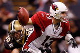 NEW ORLEANS - DECEMBER 16: Quarterback Kurt Warner #13 of the Arizona Cardinals is sacked by Scott Fujita #55 of the New Orleans Saints on December 16, 2007 at the Louisiana Superdome in New Orleans, Louisiana. The Saints defeated the Cardinals 31-24.   (Photo by Chris Graythen/Getty Images)