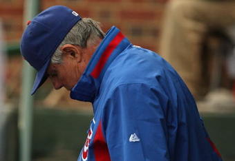 CHICAGO - JULY 08: Manager Lou Piniella #41 of the Chicago Cubs paces in the dugout during a game against the Atlanta Braves on July 8, 2009 at Wrigley Field in Chicago, Illinois. The Braves defeated the Cubs 4-1. (Photo by Jonathan Daniel/Getty Images)