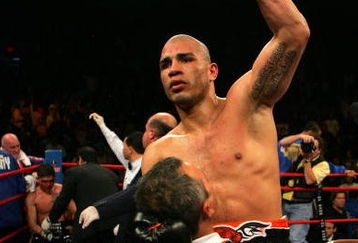 NEW YORK - FEBRUARY 21: Miguel Cotto is picked up by Evangelista Cotto to celebrate his 5th round TKO over Michael Jennings in their WBO World Welterweight title bout at Madison Square Garden on February 21, 2009 in New York City.  (Photo by Chris Trotman/Getty Images)