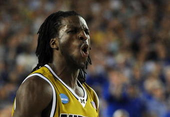 GLENDALE, AZ - MARCH 26:  Forward DeMarre Carroll #1 of the Missouri Tigers celebrates after a play against the Memphis Tigers in the Sweet 16 of the NCAA Division I Men's Basketball Tournament at the University of Phoenix Stadium on March 26, 2009 in Glendale, Arizona.  (Photo by Ronald Martinez/Getty Images)