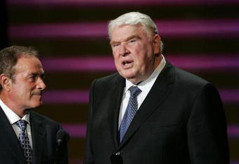 HOLLYWOOD - JULY 14:  Legendary sportscasters Al Michaels and John Madden speak at the 12th Annual ESPY Awards held at the Kodak Theatre on July 14, 2004 in Hollywood, California.  This year's ESPY's will air Sunday, July 16th on ESPN beginning 9 PM EST/6 PM EST.  (Photo by Carlo Allegri/Getty Images)