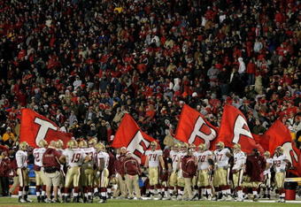 COLLEGE PARK, MD - NOVEMBER 10:  Maryland Terrapins cheerleaders parade the Terps flags behind the Boston College Eagles bench as Maryland defeated Boston College 42-35 at Byrd Stadium on November 10, 2007 in College Park, Maryland.  (Photo by Doug Pensinger/Getty Images)