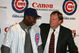 CHICAGO - NOVEMBER 30:  General manager Jim Hendry (R) of the Chicago Cubs introduces Alfonso Soriano #12 during a press conference to announce the sigining of Soriano to an eight year free agent contract November 30, 2006 at the Stadium Club at Wrigley Field in Chicago, Illinois.  (Photo by Chris Chambers/Getty Images)