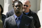 RICHMOND, VA - JULY 26:   Atlanta Falcons quarterback Michael Vick leaves the federal courthouse following his arraignment on July 26, 2007 in Richmond, Virginia. Vick pleaded not guilty Thursday to federal dogfighting charges and was released without bond until a November 26 trial.  (Photo by Haraz N. Ghanbari-Pool/Getty Images)
