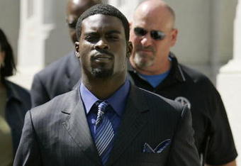RICHMOND, VA - JULY 26:   Atlanta Falcons quarterback Michael Vick leaves the federal courthouse following his arraignment on July 26, 2007 in Richmond, Virginia. Vick pleaded not guilty Thursday to federal dogfighting charges and was released without bond until a November 26 trial.  (Photo by Haraz N. Ghanbari-Pool/Getty Images)