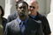 RICHMOND, VA - JULY 26:   Atlanta Falcons quarterback Michael Vick leaves the federal courthouse following his arraignment on July 26, 2007 in Richmond, Virginia. Vick pleaded not guilty Thursday to federal dogfighting charges and was released without bond until a November 26 trial.  (Photo by Haraz N. Ghanbari-Pool/Getty Images)
