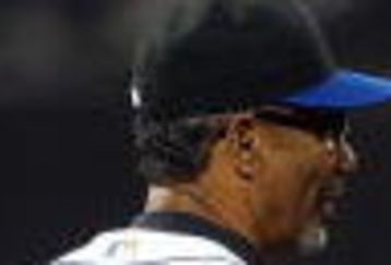 NEW YORK - JULY 09:  Manager Jerry Manuel of the New York Mets argues with second base umpire John Hirschbeck against the Los Angeles Dodgers on July 9, 2009 at Citi Field in the Flushing neighborhood of the Queens borough of New York City.  (Photo by Jim McIsaac/Getty Images)