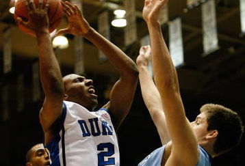 DURHAM, NC - FEBRUARY 11:  Nolan Smith #2 of the Duke Blue Devils goes up with the ball against Bobby Frasor #4 of the North Carolina Tar Heels during the game on February 11, 2009 at Cameron Indoor Stadium in Durham, North Carolina.  (Photo by Kevin C. Cox/Getty Images)