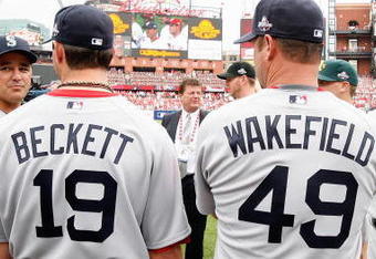 ST. LOUIS, MO - JULY 14:  American League All-Stars Josh Beckett #19 and Tim Wakefield #49 of the Boston Red Sox look on before the 2009 MLB All-Star Game at Busch Stadium on July 14, 2009 in St Louis, Missouri. (Photo by Dilip Vishwanat/Getty Images)