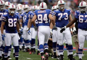 ORCHARD PARK, NY - SEPTEMBER 21:  Aaron Schobel #94 of the Buffalo Bills runs onto the field before the game against the Oakland Raiders on September 21, 2008 at Ralph Wilson Stadium in Orchard Park, New York. (Photo by Rick Stewart/Getty Images)