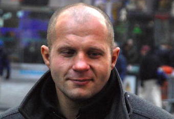 NEW YORK - JANUARY 20:  Fedor Vladimirovich Emelianenko, heavyweight mixed martial artist and current World Alliance of Mixed Martial Arts heavyweight champion rings the NASDAQ opening bell at NASDAQ in Times Square on January 20, 2009 in New York City.  (Photo by Joe Corrigan/Getty Images)