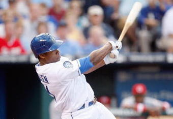 KANSAS CITY - JUNE 12: Jose Guillen #11 of the Kansas City Royals swings at the pitch during the game against the Cincinnati Reds on June 12, 2009 at Kauffman Stadium in Kansas City, Missouri. (Photo by Jamie Squire/Getty Images)