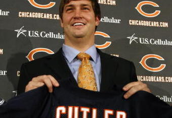 LAKE FOREST, IL - APRIL 3: Quarterback Jay Cutler of the Chicago Bears holds up his #6 jersey after he was introduced as their new quarterback during a press conference on April 3, 2009 at Halas Hall in Lake Forest, Illinois. (Photo by Jim Prisching/Getty Images)