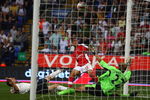 BOLTON, UNITED KINGDOM - SEPTEMBER 20:  Denilson of Arsenal scores his team's third goal past Jussi Jaaskelainen of Bolton Wanderers during the Barclays Premier League match between Bolton Wanderers and Arsenal at the Reebok Stadium on September 20, 2008 in Bolton, England.  (Photo by Phil Cole/Getty Images)