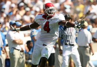 PASADENA, CA - SEPTEMBER 27:  Damion Owens #4 of the Frenso State Bulldogs celebrates a defensive play against the UCLA Bruins during the game on September 27, 2008 at the Rose Bowl in Pasadena, California.  (Photo by Stephen Dunn/Getty Images)