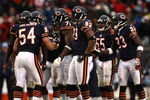CHICAGO - NOVEMBER 09:  Brian Urlacher #54 of the Chicago Bears stands in the huddle with the defense against the Tennessee Titans at Soldier Field on November 9, 2008 in Chicago, Illinois.  (Photo by Jonathan Ferrey/Getty Images)