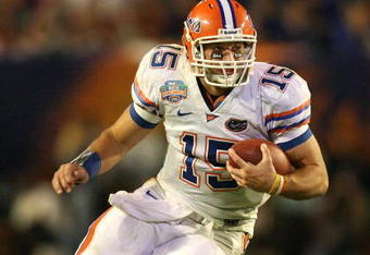 MIAMI - JANUARY 08:  Tim Tebow #15 of the Florida Gators runs the ball against the Oklahoma Sooners during the FedEx BCS National Championship game at Dolphin Stadium on January 8, 2009 in Miami, Florida.  (Photo by Doug Benc/Getty Images)