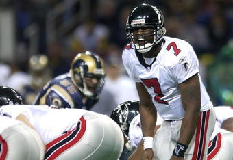 6 Jan 2002: Michael Vick #7 of the Atlanta Falcons calls out the play against the St. Louis Rams at the Dome at America's Center in St. Louis, Missouri. The St. Louis Rams beat the Atlanta Falcons 31-13.  DIGITAL IMAGE. Mandatory Credit: Elsa /Getty Images