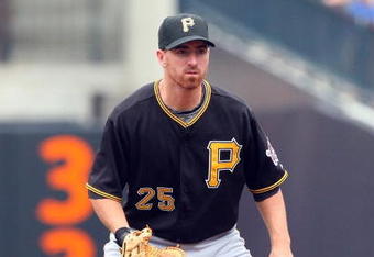 NEW YORK - MAY 09:  Adam LaRoche #25 of the Pittsburgh Pirates plays the field against the New York Mets on May 9, 2009 at Citi Field in the Flushing neighborhood of the Queens borough of New York City. The Mets defeated the Pirates 10-1.  (Photo by Jim McIsaac/Getty Images)