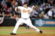 BALTIMORE - APRIL 8:  George Sherrill #52 of the Baltimore Orioles pitches against the New York Yankees at Camden Yards April 8, 2009 in Baltimore, Maryland.  (Photo by Greg Fiume/Getty Images)