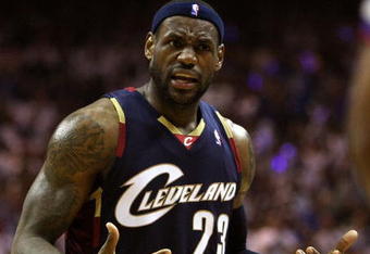 ORLANDO, FL - MAY 30:  LeBron James #23 of the Cleveland Cavaliers reacts after a play against the Orlando Magic in Game Six of the Eastern Conference Finals during the 2009 Playoffs at Amway Arena on May 30, 2009 in Orlando, Florida. NOTE TO USER: User expressly acknowledges and agrees that, by downloading and or using this photograph, User is consenting to the terms and conditions of the Getty Images License Agreement  (Photo by Elsa/Getty Images)