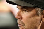 PHOENIX - JUNE 11:  Manager Bruce Bochy of the San Francisco Giants signals a play during the major league baseball game against the Arizona Diamondbacks at Chase Field on June 11, 2009 in Phoenix, Arizona.  (Photo by Christian Petersen/Getty Images)