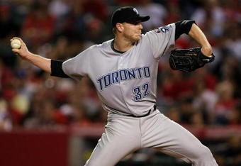 ANAHEIM, CA - MAY 6:  Roy Halladay #32 of the Toronto Blue Jays throws a pitch against the Los Angeles Angels of Anaheim at Angel Stadium May 6, 2009 in Anaheim, California.  (Photo by Stephen Dunn/Getty Images)