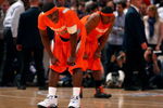 NEW YORK - MARCH 12:  Jonny Flynn #10 and Paul Harris #11 of the Syracuse Orange look on during the 4th overtime against the Connecticut Huskies during the quarterfinals of the Big East Tournament at Madison Square Garden on March 12, 2009 in New York City.  (Photo by Jim McIsaac/Getty Images)