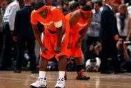 NEW YORK - MARCH 12:  Jonny Flynn #10 and Paul Harris #11 of the Syracuse Orange look on during the 4th overtime against the Connecticut Huskies during the quarterfinals of the Big East Tournament at Madison Square Garden on March 12, 2009 in New York City.  (Photo by Jim McIsaac/Getty Images)