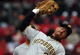 ST. LOUIS - APRIL 06:  Adam LaRoche #25 of the Pittsburgh Pirates makes the catch for the out during Opening Day on April 6, 2009  at Busch Stadium in St. Louis, Missouri. The Pittsburgh Pirates defeated the St. Louis Cardinals 6-4.  (Photo by Elsa/Getty Images)