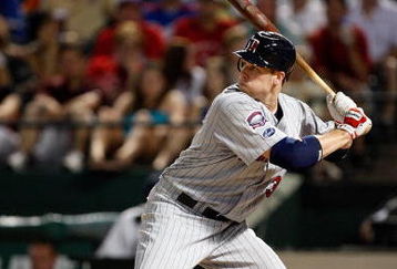 ARLINGTON, TX - JULY 17:  First baseman Justin Morneau #33 of the Minnesota Twins on July 17, 2009 at Rangers Ballpark in Arlington, Texas.  (Photo by Ronald Martinez/Getty Images)