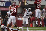 TUSCALOOSA, AL - NOVEMBER 29:  Quarterback Kodi Burns #18 of the Auburn Tigers has a pass tipped by defensive lineman Bobby Greenwood #93 and linebacker Rolando McClain #25 of the Alabama Crimson Tide at Bryant-Denny Stadium on November 29, 2008 in Tuscaloosa, Alabama.  (Photo by Doug Benc/Getty Images)