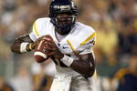 TAMPA, FL - SEPTEMBER 28: Jarrett Brown #16 of the West Virginia Mountaineers looks to pass the ball during the game against the University of South Florida Bulls at Raymond James Stadium September 28, 2007 in Tampa Florida. (Photo by Marc Serota/Getty Images)
