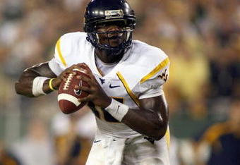 TAMPA, FL - SEPTEMBER 28: Jarrett Brown #16 of the West Virginia Mountaineers looks to pass the ball during the game against the University of South Florida Bulls at Raymond James Stadium September 28, 2007 in Tampa Florida. (Photo by Marc Serota/Getty Images)