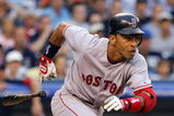 NEW YORK - JULY 03:  Julio Lugo #23 of the Boston Red Sox runs to first after a sacfrice bunt in the second inning moving runners to second and third against the New York Yankees on July 3, 2008 at Yankee Stadium in the Bronx borough of New York City.  (Photo by Jim McIsaac/Getty Images)