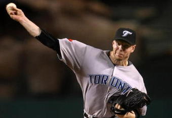 ANAHEIM, CA - MAY 6:  Roy Halladay #32 of the Toronto Blue Jays throws a pitch against the Los Angeles Angels of Anaheim at Angel Stadium May 6, 2009 in Anaheim, California.  (Photo by Stephen Dunn/Getty Images)
