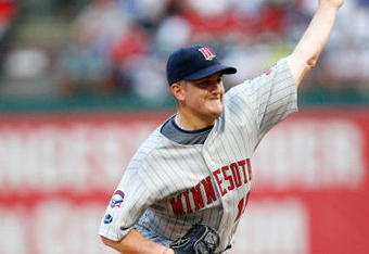ARLINGTON, TX - JULY 17:  Pitcher Glen Perkins #15 of the Minnesota Twins throws against the Texas Rangers on July 17, 2009 at Rangers Ballpark in Arlington, Texas.  (Photo by Ronald Martinez/Getty Images)