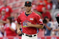ST. LOUIS, MO - JULY 12: U.S. Futures All-Star Madison Bumgarner of the San Francisco Giants runs onto the field during the 2009 XM All-Star Futures Game at Busch Stadium on July 12, 2009 in St. Louis, Missouri. (Photo by Jamie Squire/Getty Images)