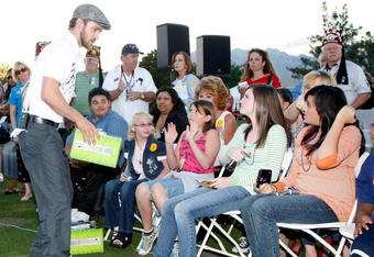 LAS VEGAS - OCTOBER 18:  Singer Justin Timberlake hands out Xbox 360 video game consoles to youth from Shriners Hospitals during a golf clinic for kids during the Justin Timberlake Shriners Hospitals for Children Open golf tournament at the TPC Summerlin October 18, 2008 in Las Vegas, Nevada.  (Photo by Ethan Miller/Getty Images for InStyle)