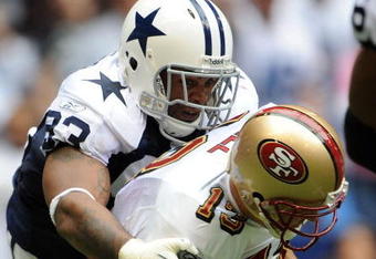IRVING, TX - NOVEMBER 23:  Quarterback Shaun Hill #13 of the San Francisco 49ers is tackled by Anthony Spencer #93 of the Dallas Cowboys at Texas Stadium on November 23, 2008 in Irving, Texas.  (Photo by Ronald Martinez/Getty Images)