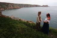PENZANCE, UNITED KINGDOM - SEPTEMBER 17:  Members of Cambridge University's Gilbert and Sullivan  Society warm up and rehearse their lines backstage as they perform 'The Yeomen Of The Guard' at the Minack Theatre's penultimate summer matinee performance at the Minack Theatre on September 17 2008 in Cornwall, England. The operatic production - which ends tomorrow - will finish the World famous open-air theatre's worst season on record for cancellations and abandoned performances, caused by the unusually wet and unsettled summer weather.  The theatre, built by Rowena Cade in the 1930s and carved into the granite cliffs above the sea at Porthcurno, attracts about 75,000 theatre-goers every summer to watch summer performances - ranging from Shakespeare to musicals which are held from May until September, although the grounds and exhibition centre are open all year.  (Photo by Matt Cardy/Getty Images)