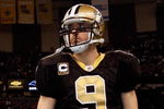 NEW ORLEANS - DECEMBER 28:  Quarterback Drew Brees #9 of the New Orleans Saints walks off the field after losing to the Carolina Panthers 33-31 on December 28, 2008 at the Superdome in New Orleans, Louisiana.  (Photo by Chris Graythen/Getty Images)