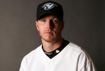 DUNEDIN, FL - FEBRUARY 23:  Roy Halladay #32 poses for a portrait during the Toronto Blue Jays Photo Day on February 23, 2007 at the Bobby Mattick Training Center in Dunedin, Florida.  (Photo by Elsa/Getty Images)