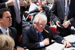 MONTREAL, QC - JUNE 27:  General Manager and President Glen Sather of the New York Rangers (C) works at the draft table during the 2009 NHL Entry Draft at the Bell Centre on June 27, 2009 in Montreal, Quebec, Canada. (Photo by Bruce Bennett/Getty Images)