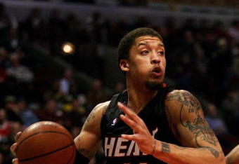 CHICAGO - FEBRUARY 12: Michael Beasley #30 of the Miami Heat drives to the basket against the Chicago Bulls on February 12, 2009 at the United Center in Chicago, Illinois. The Heat defeated the Bulls 95-93. NOTE TO USER: User expressly acknowledges and agreees that, by downloading and/or using this Photograph, User is consenting to the terms and conditions of the Getty Images License Agreement.  (Photo by Jonathan Daniel/Getty Images)
