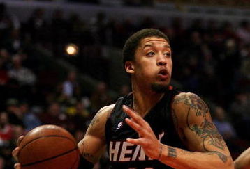 CHICAGO - FEBRUARY 12: Michael Beasley #30 of the Miami Heat drives to the basket against the Chicago Bulls on February 12, 2009 at the United Center in Chicago, Illinois. The Heat defeated the Bulls 95-93. NOTE TO USER: User expressly acknowledges and agreees that, by downloading and/or using this Photograph, User is consenting to the terms and conditions of the Getty Images License Agreement.  (Photo by Jonathan Daniel/Getty Images)