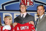 NEW YORK CITY - APRIL 23:  Quarterback Alex Smith (C) (Utah), who was drafted first overall by the San Francisco 49ers, poses with his family during the 70th NFL Draft on April 23, 2005 at the Jacob K. Javits Convention Center in New York City.  (Photo by Chris Trotman/Getty Images)