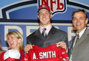 NEW YORK CITY - APRIL 23:  Quarterback Alex Smith (C) (Utah), who was drafted first overall by the San Francisco 49ers, poses with his family during the 70th NFL Draft on April 23, 2005 at the Jacob K. Javits Convention Center in New York City.  (Photo by Chris Trotman/Getty Images)