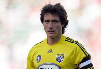 CARSON, CA - APRIL 05:  Guillermo Barros Schelotto #7 of the Columbus Crew walks to the corner to take a corner kick during the MLS match against Chivas USA at The Home Depot Center on April 5, 2009 in Carson, California. Chivas USA defeated the Crew 3-2.  (Photo by Victor Decolongon/Getty Images)